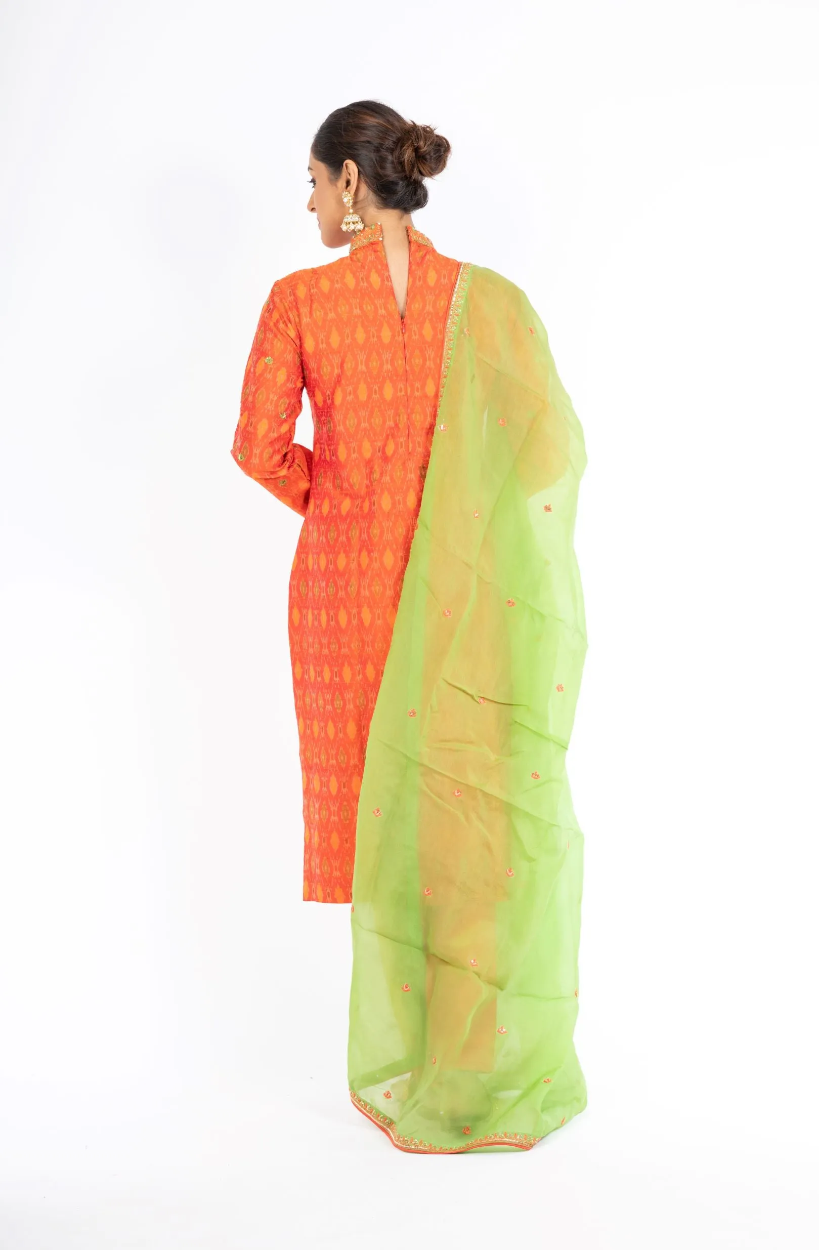 Alluring Mandarin Orange Raw Silk Ikkat Salwar Kameez