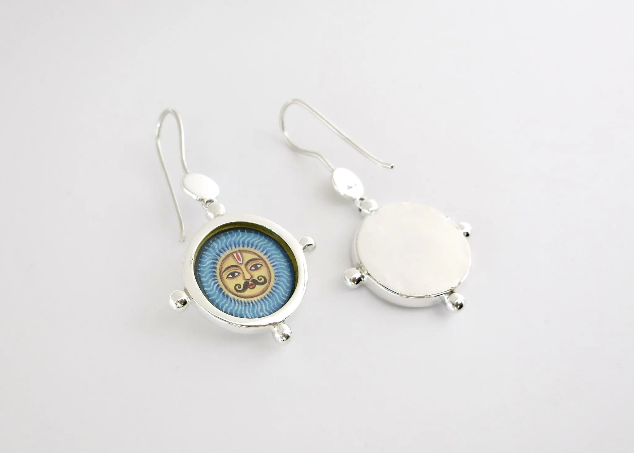 Asymmetrical Chandra (moon) and Surya (sun) earrings